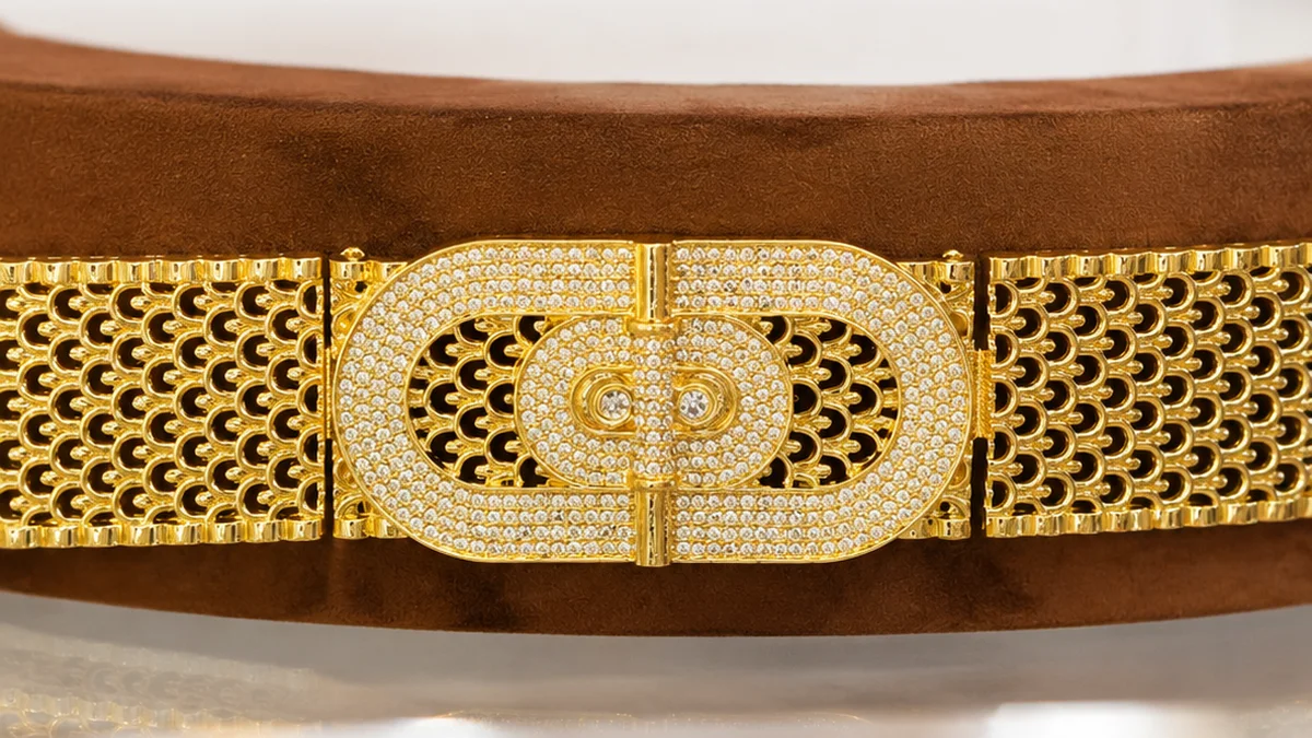 A gold heritage belt with black detail